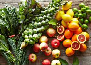 a group of fruits and vegetables on a wood surface Healthy Weight Loss Diets Pollokshields